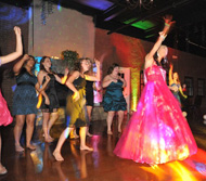 Girls in formal dresses on the dance floor